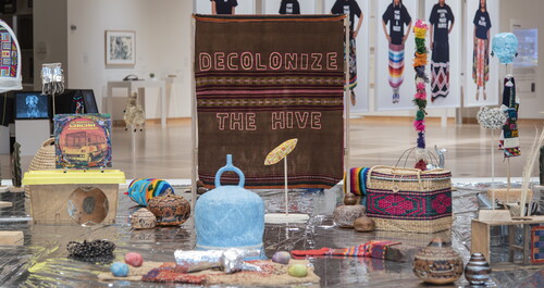 Juan William Chávez (American, b. 1977), Survival Blanket (Decolonize the Hive), 2023. Mixed-media installation, 15 x 15 ft. Installation view, Sharing the Same Breath, John Michael Kohler Arts Center, Sheboygan, WI, 2023. Photo courtesy of John Michael Kohler Arts Center.